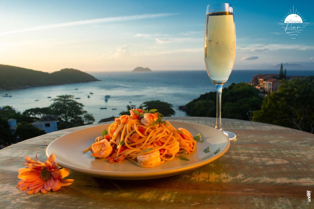 Pousada Praia Joao Fernandes Búzios Extérieur photo A glass of Prosecco with a meal