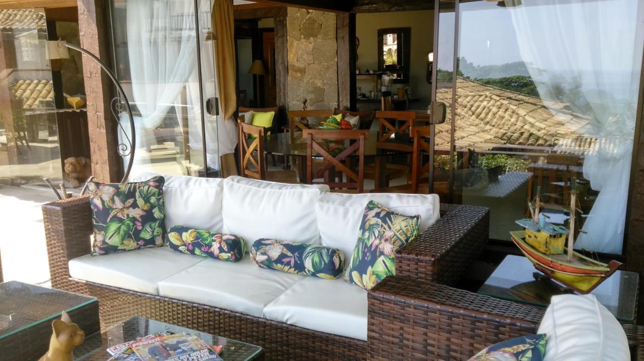 Pousada Praia Joao Fernandes Búzios Extérieur photo A rattan sofa